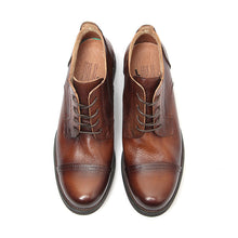 British vintage colored and worn leather derby shoes