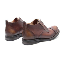 British vintage colored and worn leather derby shoes